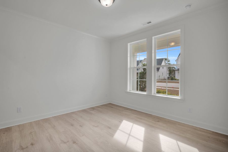 Representative unfurnished interior of a home built from the The Hampton by RobuckHomes in Windwater, Hampstead (Image 56).