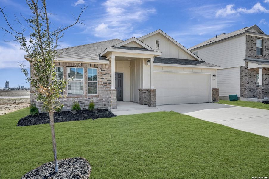 Front exterior of a new home in Greenspoint Heights, Seguin, TX, highlighting curb appeal (Image 24).