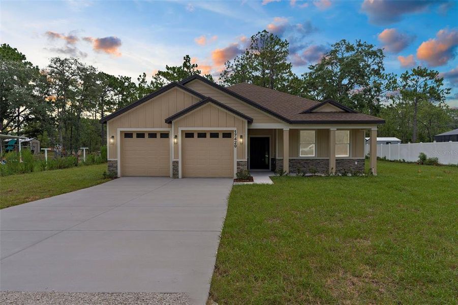 Front exterior of a new home in , Weeki Wachee, FL, highlighting curb appeal (Image 2). Front exterior of a new home in , Weeki Wachee, FL, highlighting curb appeal (Image 2).