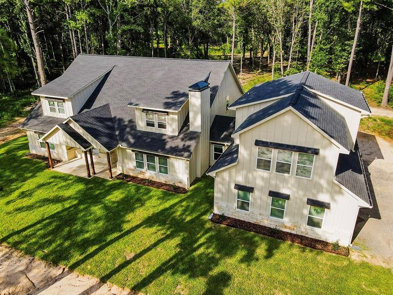 Front exterior of a new home in , Athens, TX, highlighting curb appeal (Image 2). Front exterior of a new home in , Athens, TX, highlighting curb appeal (Image 2).