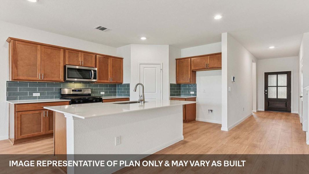 Representative furnished interior of a home built from the The Mitchell by D.R. Horton in Bar W Ranch, Leander (Image 5).