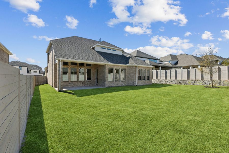 Exterior details and patio area of a home in Painted Tree Lakeside, McKinney (Image 26).