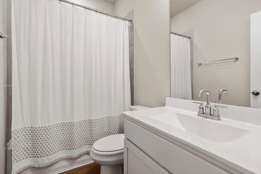 Secondary full bathroom on first floor Secondary full bathroom on first floor