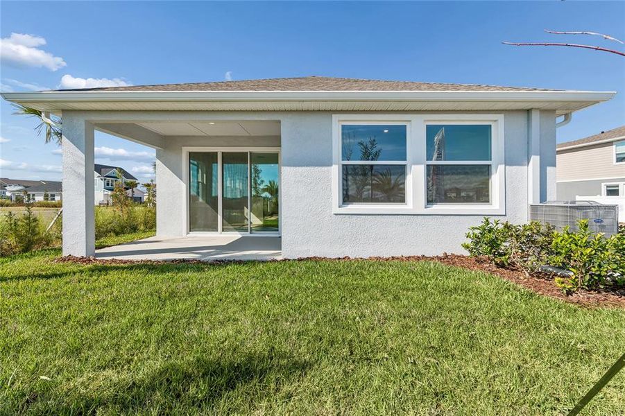Exterior details and patio area of a home in Chapel Crossings - Garden Series, Wesley Chapel (Image 20). Exterior details and patio area of a home in Chapel Crossings - Garden Series, Wesley Chapel (Image 20).