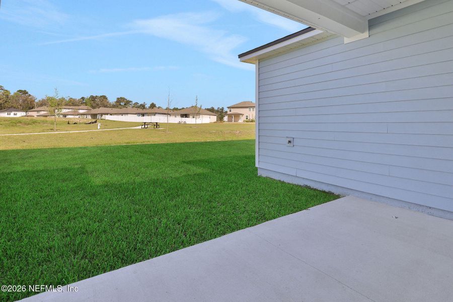 Exterior details and patio area of a home in Jennings Farm, Middleburg (Image 28).