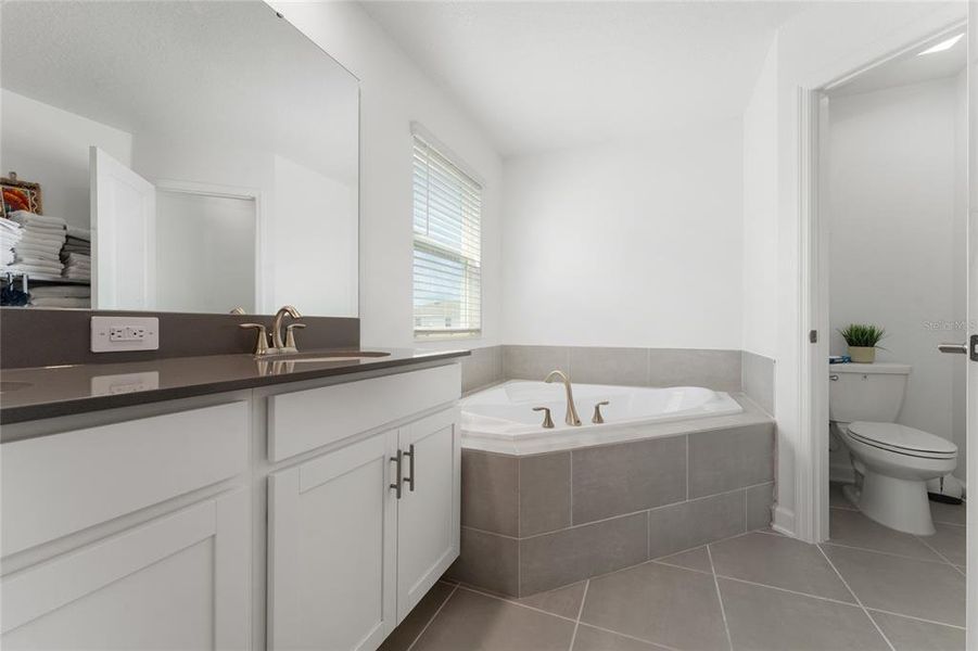 Furnished interior view inside a new home in Storey Park: Innovation Manor Collection, Orlando (Image 13).