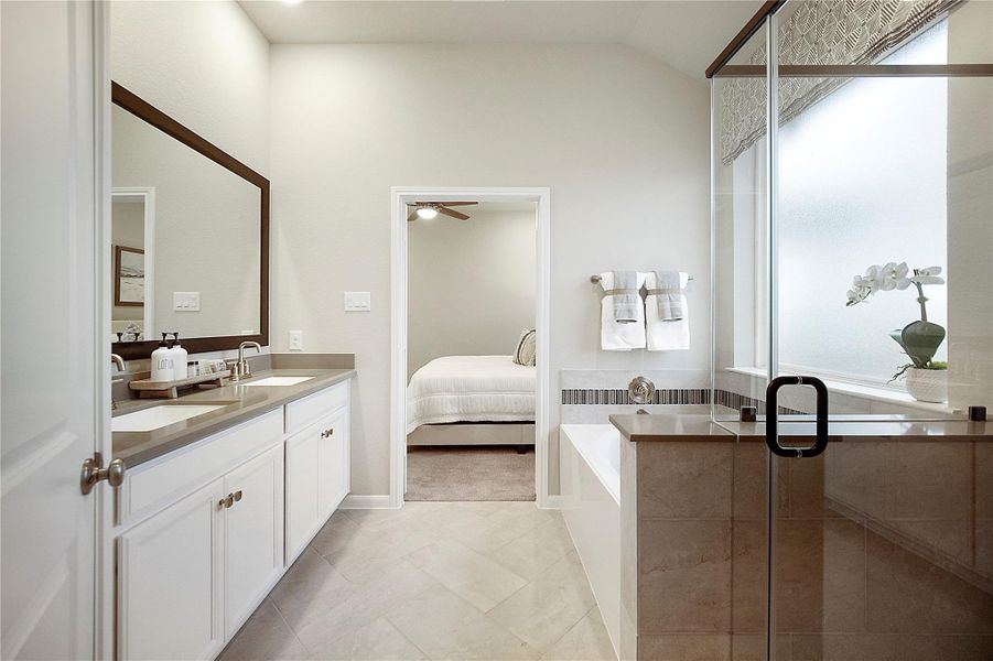 Furnished interior view inside a new home in Sunterra: Premier Collection, Katy (Image 7). Furnished interior view inside a new home in Sunterra: Premier Collection, Katy (Image 7).