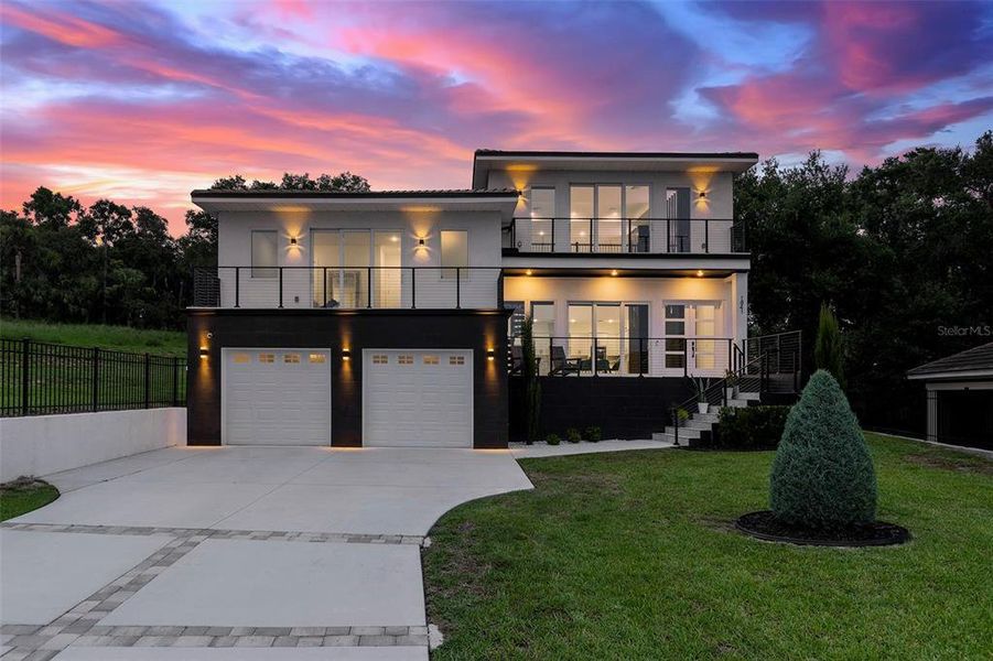 Front exterior of a new home in , Clermont, FL, highlighting curb appeal (Image 37). Front exterior of a new home in , Clermont, FL, highlighting curb appeal (Image 37).