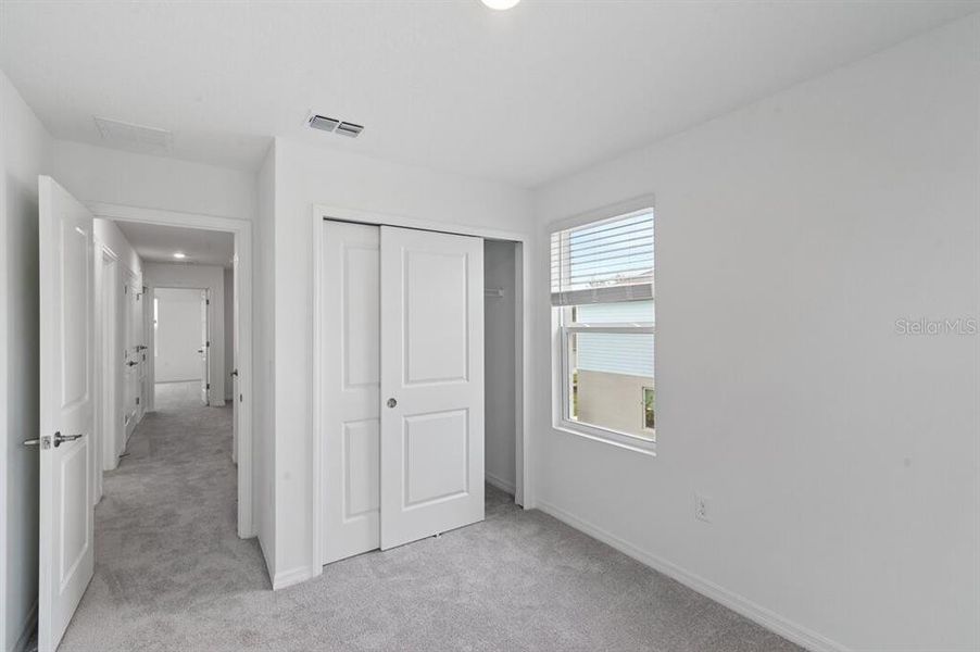 Spacious, unfurnished interior of a new home in Waterstone Townhomes, Groveland (Image 26).