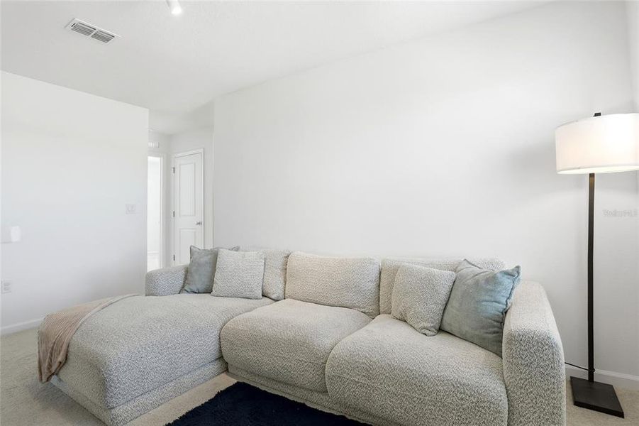 Furnished interior view inside a new home in Westview, Kissimmee (Image 35).