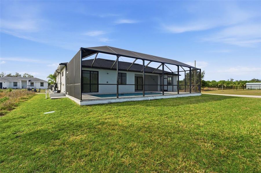 Exterior details and patio area of a home in , Port Charlotte (Image 21).