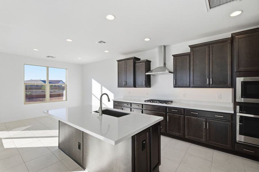 Representative furnished interior of a home built from the Triumph by Taylor Morrison in Artisan at Asante Encore Collection, Surprise (Image 6). Representative furnished interior of a home built from the Triumph by Taylor Morrison in Artisan at Asante Encore Collection, Surprise (Image 6).