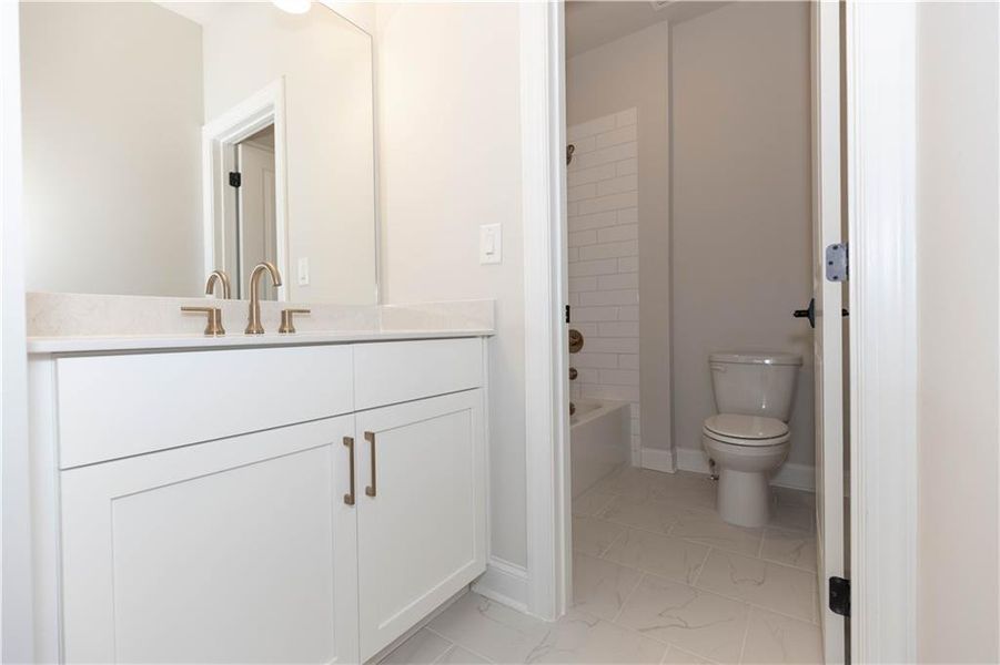 Furnished interior view inside a new home in Evanshire Single Family, Duluth (Image 4).