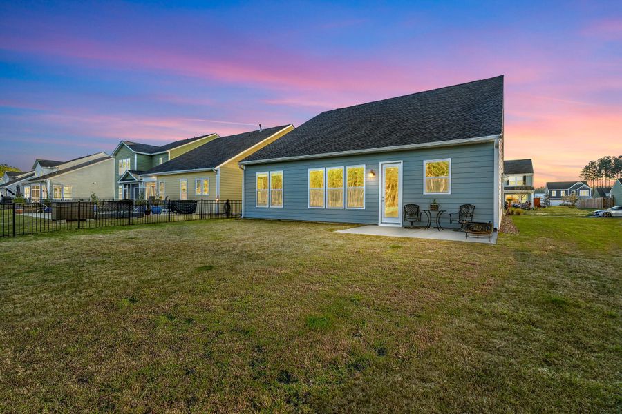 Exterior details and patio area of a home in , Ravenel (Image 3).