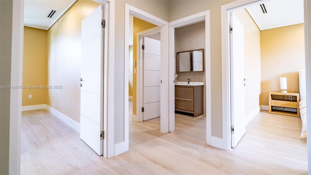 Hallway looking into Bedrooms and Bathroom