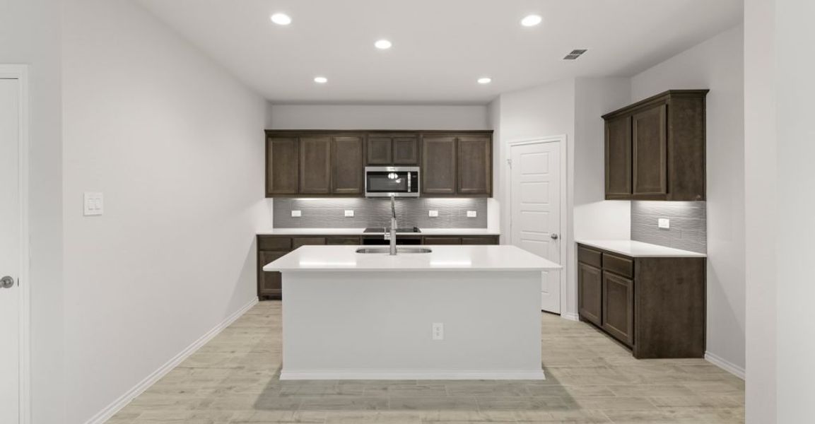 Representative exterior photo of a completed home built from the Hickory by Impression Homes in ValleyBrooke, Mesquite, TX (Image 4).