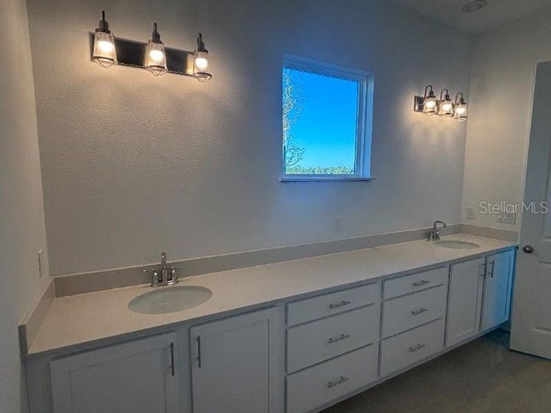 Furnished interior view inside a new home in Ardisia Park Estate, New Smyrna Beach (Image 5).