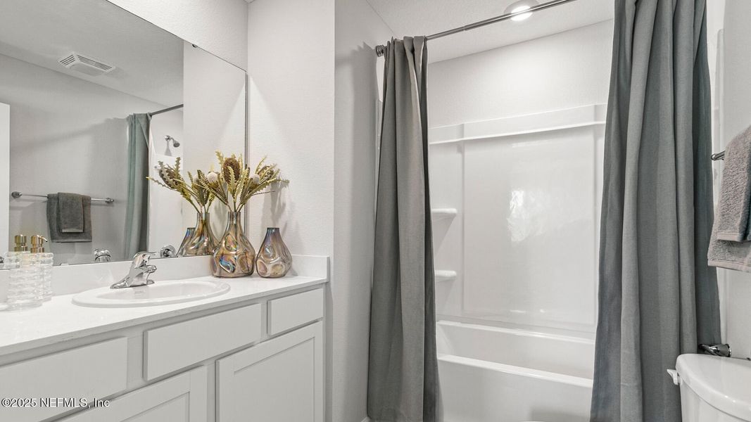 Furnished interior view inside a new home in Cordera Townhomes, St. Augustine (Image 4).