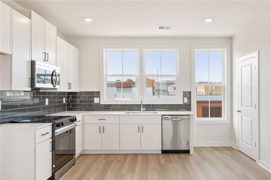 Furnished interior view inside a new home in Array, Atlanta (Image 9).
