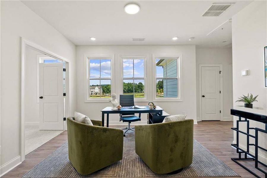 Furnished interior view inside a new home in Promenade at Sawnee Village, Cumming (Image 8). Furnished interior view inside a new home in Promenade at Sawnee Village, Cumming (Image 8).