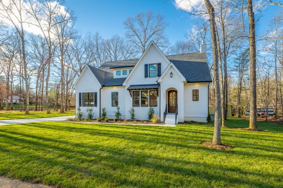 Representative exterior photo of a completed home built from the Carolina A by Riverstone Construction, LLC in Jasper Highlands, Guild, TN (Image 30).
