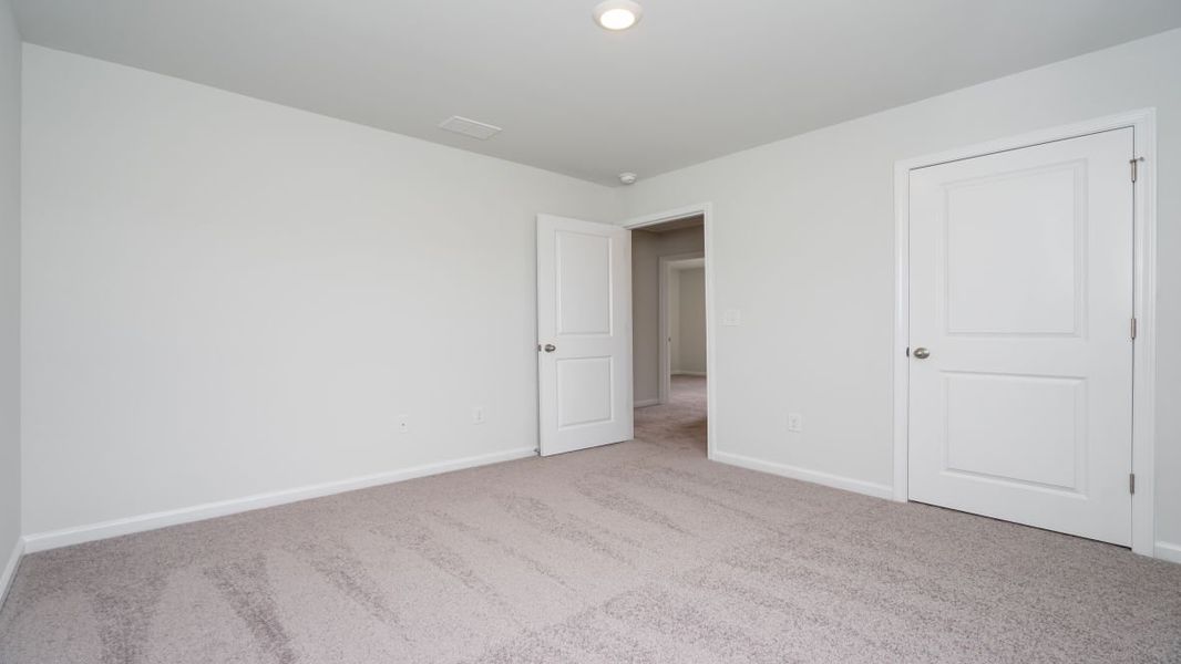 Representative unfurnished interior of a home built from the ROBIE by D.R. Horton in Island Green, Myrtle Beach (Image 40).