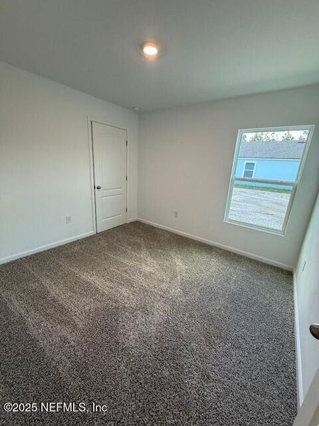 Spacious, unfurnished interior of a new home in Grand Reserve, Bunnell (Image 25).