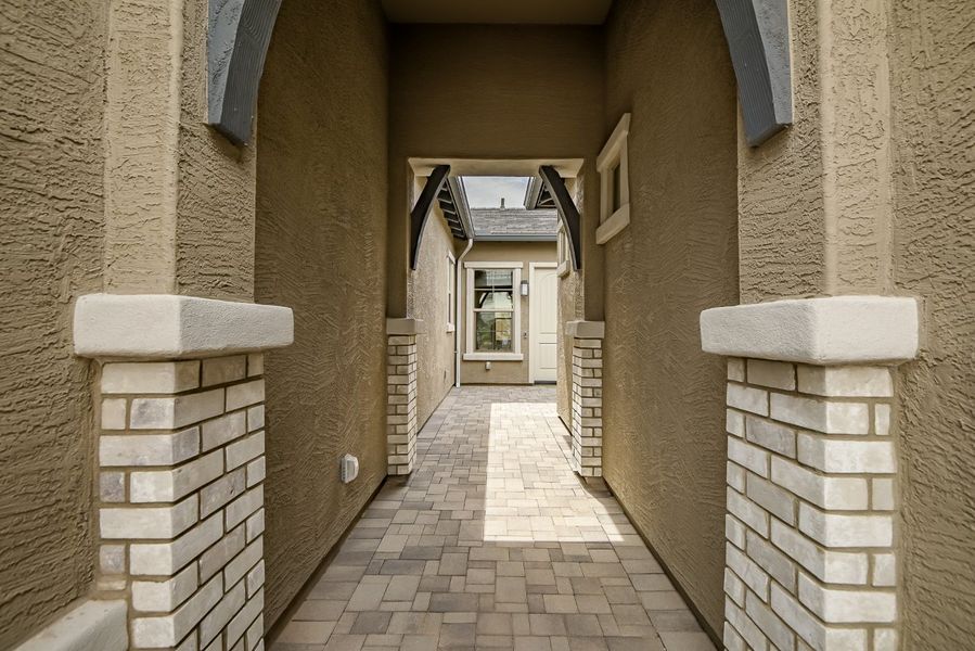 Exterior details and patio area of a home in Elegance at Eastmark, Mesa (Image 3).