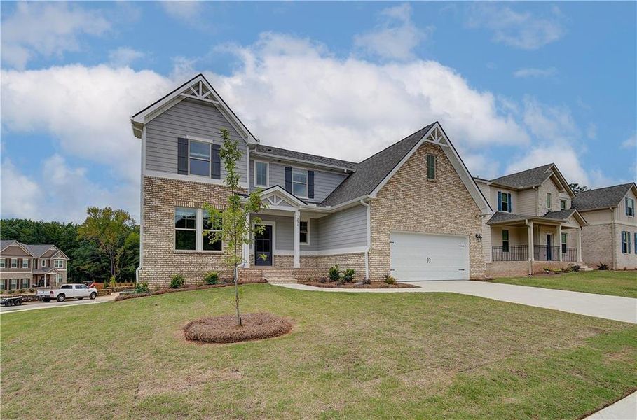 Front exterior of a new home in Kingston, Locust Grove, GA, highlighting curb appeal (Image 17).