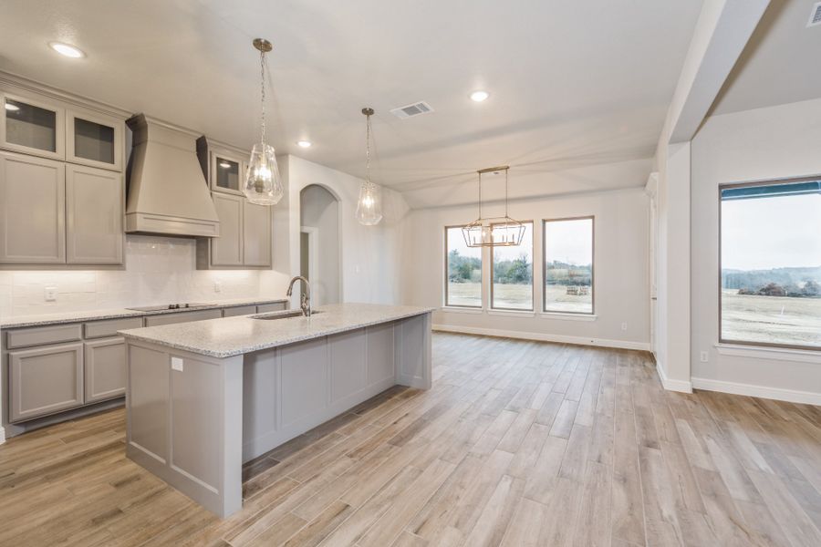 Representative furnished interior of a home built from the The Hudson by Doug Parr Custom Homes in Monarch Manor, Poolville (Image 4).