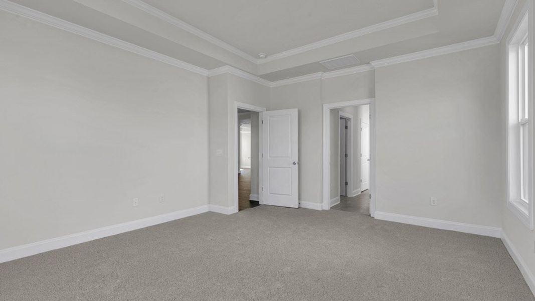 Representative unfurnished interior of a home built from the KATHRYN by D.R. Horton in Eagle Creek, Fuquay Varina (Image 11).