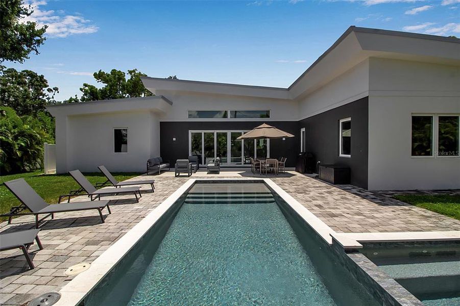 Exterior details and patio area of a home in , Sarasota (Image 2).