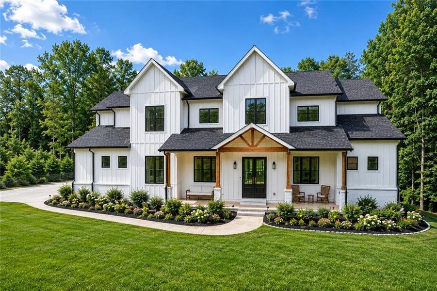 Front exterior of a new home in , Buford, GA, highlighting curb appeal (Image 24). Front exterior of a new home in , Buford, GA, highlighting curb appeal (Image 24).