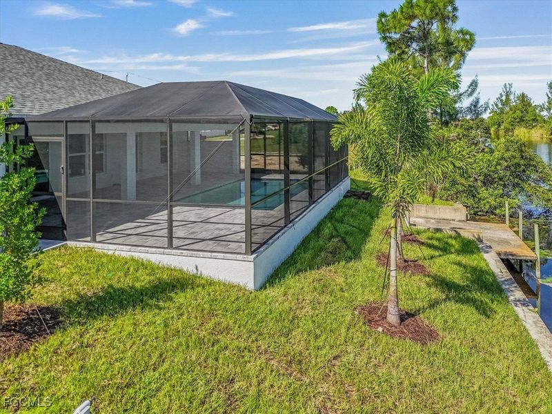 Front exterior of a new home in Cape Coral, Cape Coral, FL, highlighting curb appeal (Image 23).