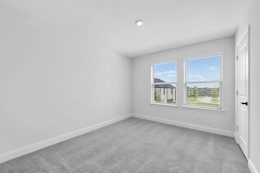 Spacious, unfurnished interior of a new home in Cross Creek Meadows, Celina (Image 26).