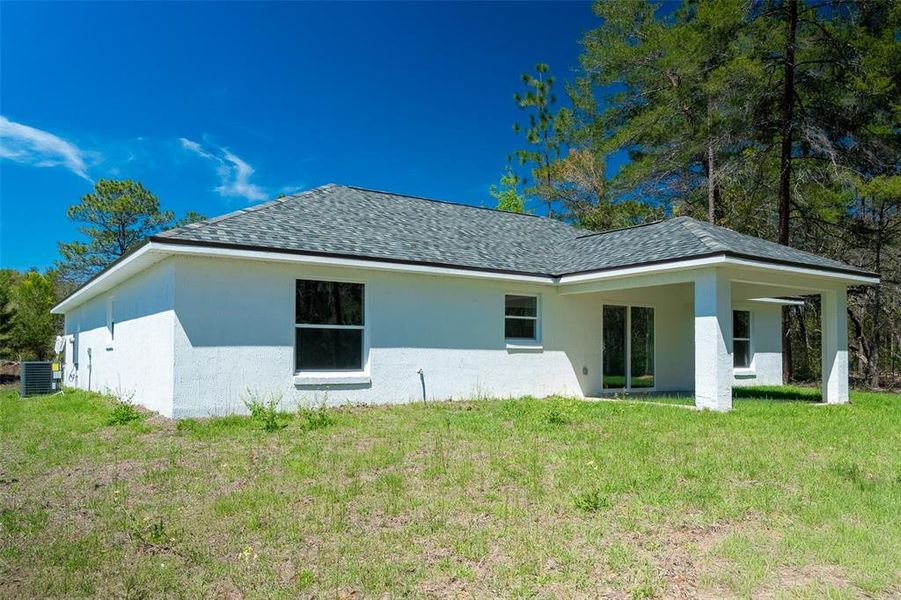 Exterior details and patio area of a home in , Ocala (Image 3).
