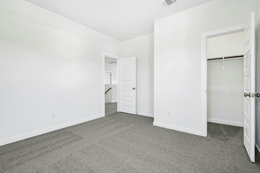 Spacious, unfurnished interior of a new home in The Colony, Bastrop (Image 34). Spacious, unfurnished interior of a new home in The Colony, Bastrop (Image 34).
