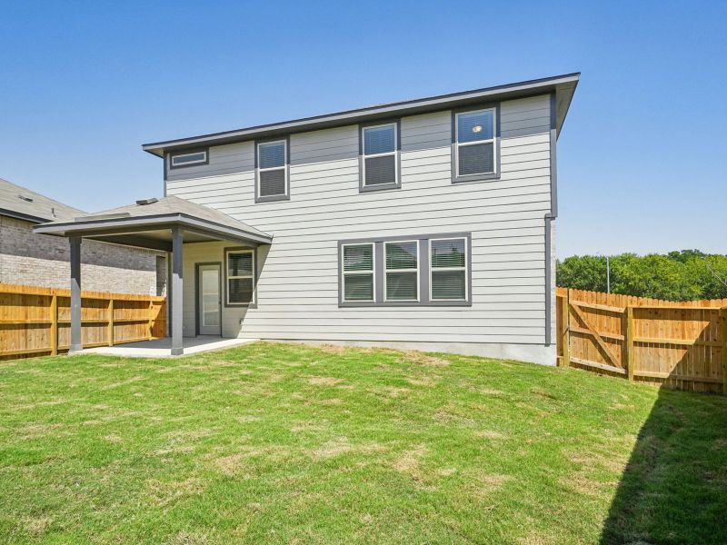 Back exterior of the Red River floorplan at a Meritage Homes community.