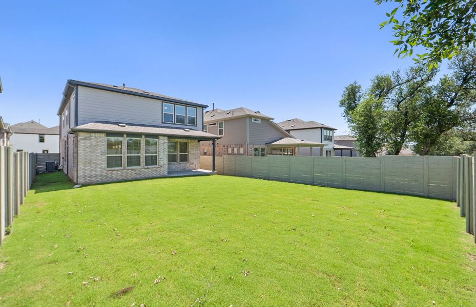 Exterior details and patio area of a home in Wolf Ranch, Georgetown (Image 25).