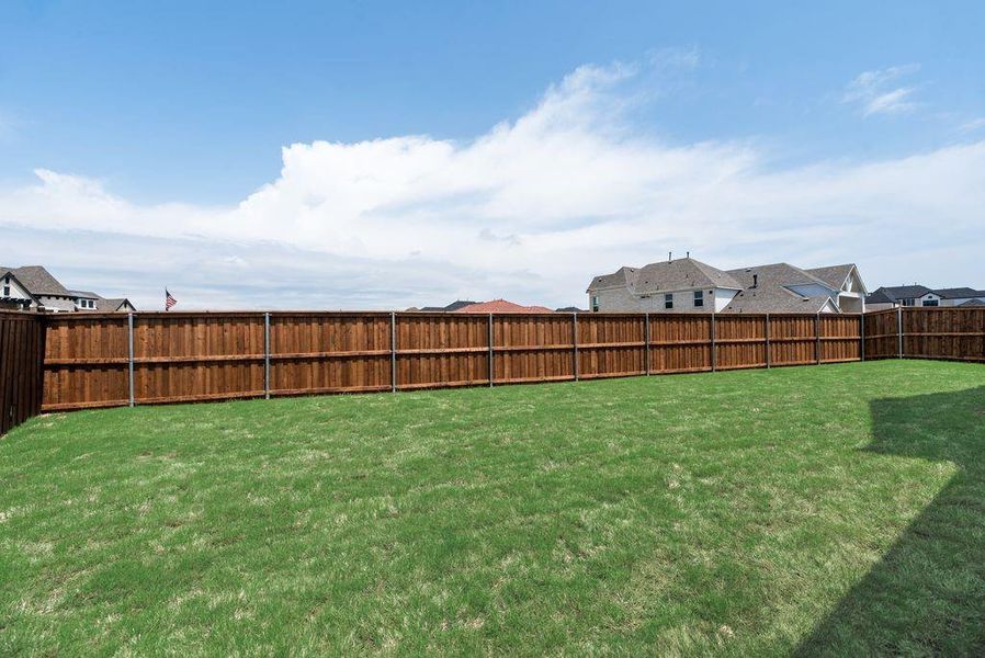 Exterior details and patio area of a home in Silverleaf Estates in Frisco, Frisco (Image 24).