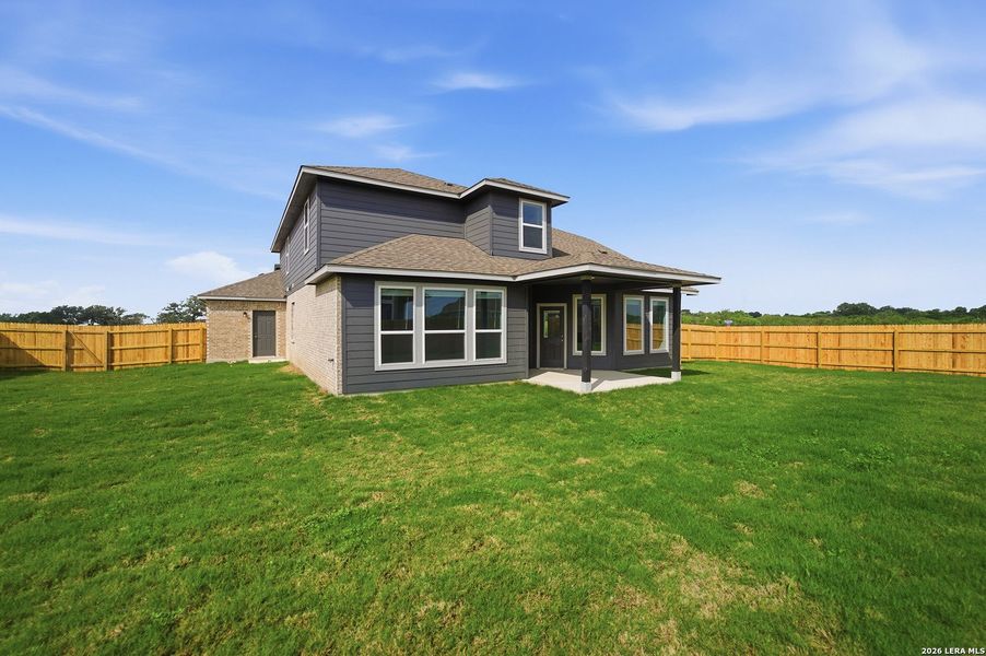 Exterior details and patio area of a home in Hickory Ridge, Elmendorf (Image 22).