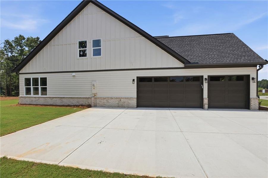 Front exterior of a new home in , Lula, GA, highlighting curb appeal (Image 1). Front exterior of a new home in , Lula, GA, highlighting curb appeal (Image 1).