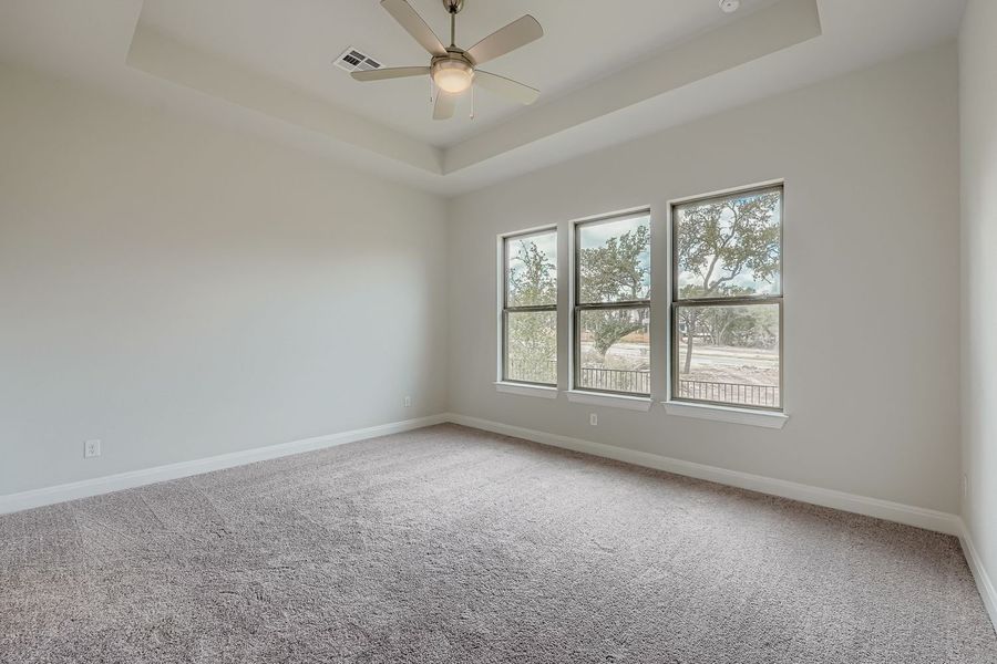 Spacious, unfurnished interior of a new home in 6 Creeks, Kyle (Image 8).
