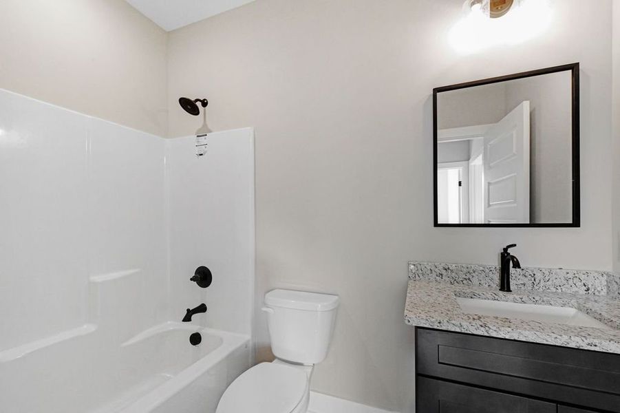 Representative exterior photo of a completed home built from the The Remi by Norfleet Builders in Judah Hills, Cross Plains, TN (Image 23).