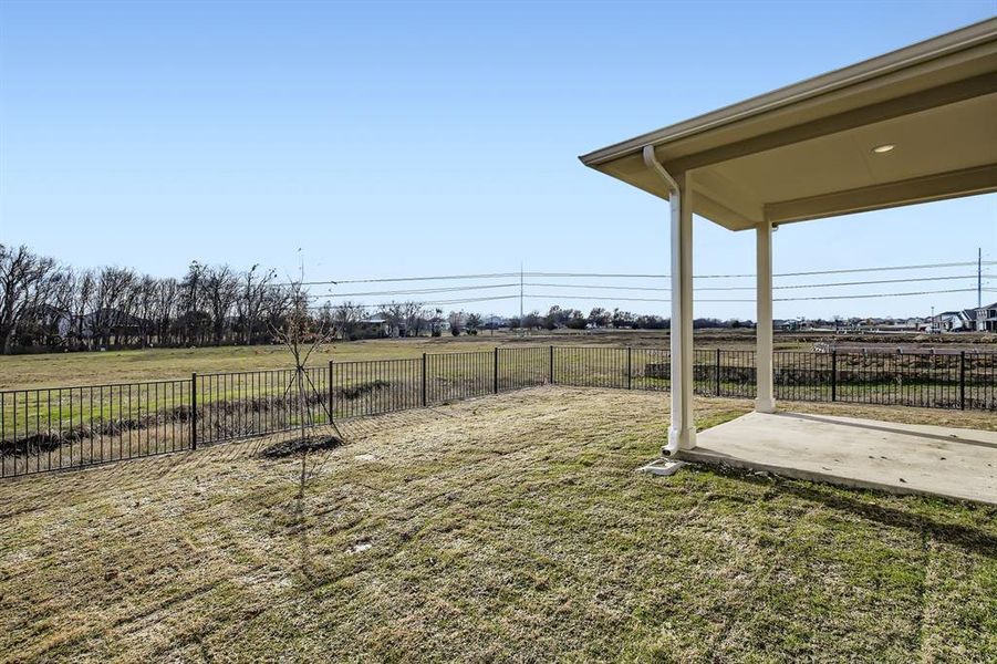 Exterior details and patio area of a home in Ambergrove, Royse City (Image 19).