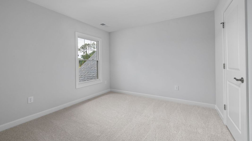 Spacious, unfurnished interior of a new home in The Courtyards at Oak Grove, Durham (Image 25).