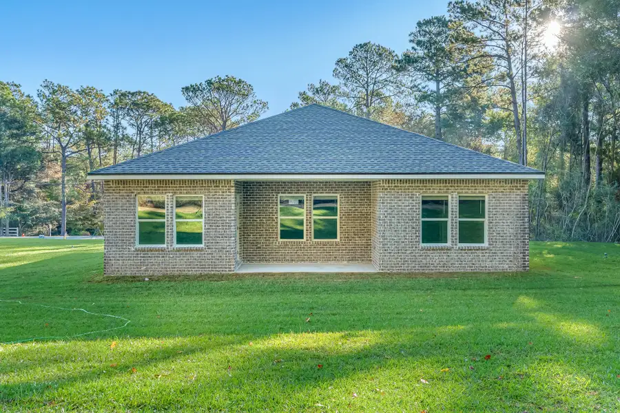 Exterior details and patio area of a home in Oak Hollow, Crestview (Image 2). Exterior details and patio area of a home in Oak Hollow, Crestview (Image 2).