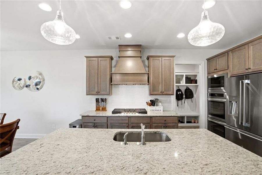 Furnished interior view inside a new home in Calgary Downs, Winder (Image 14).