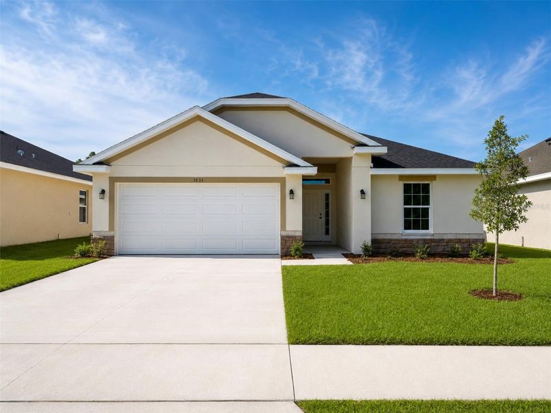 Front exterior of a new home in Arbor Park, Leesburg, FL, highlighting curb appeal (Image 1). Front exterior of a new home in Arbor Park, Leesburg, FL, highlighting curb appeal (Image 1).