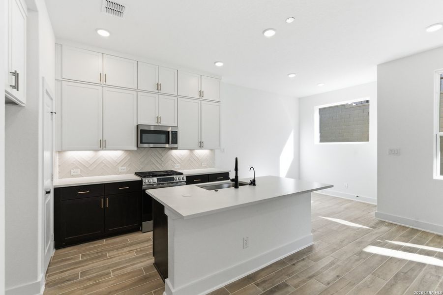 Furnished interior view inside a new home in Rose Hill, San Antonio (Image 7).